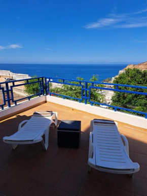 Apartment in Taurito with dream landscape and 30m2 terrace.